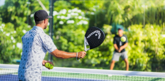 Padels up for a game of Padel Tennis at Hideaway Beach Resort & Spa
